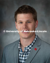 Studio portrait of Elliot Carlson, Research Assistant for Center for Brain, Biology and Behavior. Ma