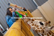 Zoe Jirovsky, a member of the University of Nebraska-Lincoln's Theme Park Design Group, shows Phoebe