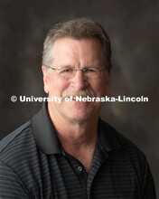 Studio portrait of Leon Whitmore, College of Arts and Sciences Personnel Generalist for the Louise P