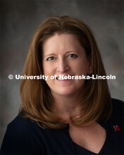 Studio portrait of Deb Fiddelke, Chief Communication and Marketing Officer, Office of University Com