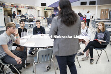 Abel Covarrubias, one of three dedicated western Nebraska recruiters, talks with interested juniors 