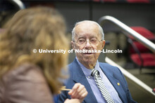 Keith Heuermann talks with others before the Heuermann Lecture. This public lecture series in the In
