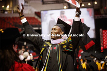 Davielle Phillips shows his family and friends his dual degrees of MBA and Master of Architecture. 2