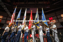 The color guard of the combined ROTC units. Undergraduate commencement at Pinnacle Bank Arena, May 4