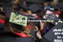 Decorated mortarboard. Undergraduate commencement at Pinnacle Bank Arena, May 4, 2019. 