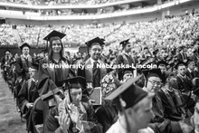 First Generation college graduates stand so they could be recognized at the end of the ceremony. Und