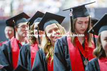 Regan Green (Chancellor Ronnie Green’s daughter) walks toward the stage.  Undergraduate commenceme