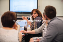 Stacey Haney, a teacher at Humann Elementary, talks with colleagues about classroom opportunities fo
