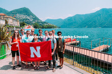 Husker group in front of Lake Lugano, Switzerland. Dr. Peter Ecklund tours with the Midwest American