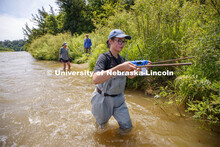 Sydney Kimnach, sophomore in environmental studies and fisheries and wildlife management, carries he