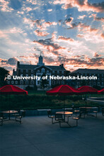 Exterior view of Neihardt Residential Center and the outdoor seating from Cather Dinning Hall. July 