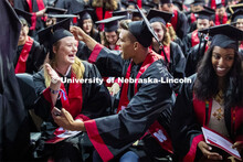 Harper Anderson and Jace Anderson hug during the ceremony when Regent Tim Claire asked all the grads
