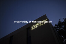 The Glenn Korff School of Music sign is lit up on the Westbrook Music Building on city campus. Augus