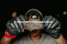 Nebraska graduate student Christopher Fill is studying the patterns of bats living at Homestead Nati