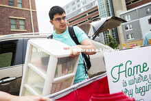 Need Shorey, a sophomore in civil engineering, moves into his University Suites resident hall. Resid