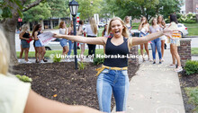 Emma Gonzales runs in for a hug at the Delta Gamma sorority as each new member was individually welc