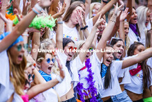 New Kappa Alpha Theta members celebrate outside their sorority. Sorority Bid Day. August 24, 2019. 
