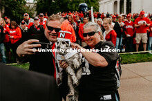 Doug Bush, lecturer at the Glenn Korff School of Music,  poses for a selfie with Joey the Cornhusker