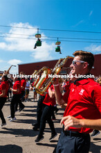 Cornhusker Marching Band Alto Saxophones dancing down the parade route. The University of Nebraska r