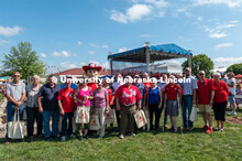 Families of the University Land Grant pose for a photo with Chancellor Ronnie Green and Herbie Huske