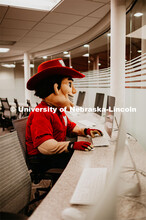Herbie working on the computer. Herbie Husker photo shoot, pictured throughout Memorial Stadium. Sep