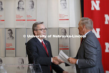 Chancellor Ronnie Green greets Kiewit CEO Bruce Grewcock to announcement the naming of Kiewit Hall, 