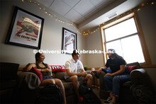Students hanging out in a Kauffman Academic Residential Center dorm room. Raikes school photo shoot.