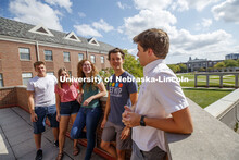 Students hanging out on the roof of the Kauffman Academic Residential Center. Raikes school photo sh