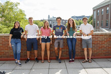 Students hanging out on the roof of the Kauffman Academic Residential Center. Raikes school photo sh