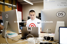 Student working on computer. Raikes school photo shoot. September 25, 2019. 