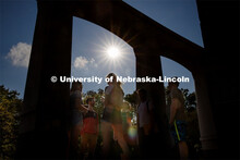 Students hanging out front of the Kauffman Academic Residential Center. Raikes school photo shoot. S