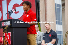Scott Frost smiles as Wan'Dale Robinson describes being a Husker. Ceremony for Nebraska is planning 