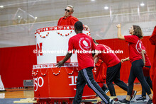 Chancellor Ronnie Green wearing the robe of the Innocents is wheeled off the floor after he popped o