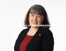 Studio portrait of Mary Kay Quinlan, Associate Dean, College of Journalism and Mass Communications. 
