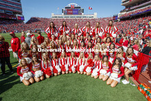 Members of the Scarlet dance team and the Cheer Squad pose for a group picture. Nebraska vs. Northwe