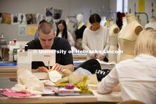 Alex Scarpello sews in the sewing studio of the Home Economics Building on East Campus. Scarpello ha