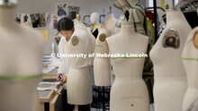 Adrianna Vang, a Junior in the Textile and Apparel Design Class, from Omaha works on a bodice muslin