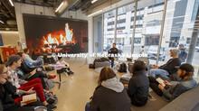 Hot learning on a cold day. Video of a fireplace takes the chill off as Jesse Fleming leads a discus