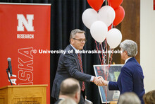 Chancellor Ronnie Green welcomes Congressman Jeff Fortenberry to the podium at the Nebraska Research