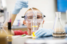 Kayla Kremke measures solutions in the Chem 113 lab. Chemistry Lab in Hamilton Hall. November 7, 201