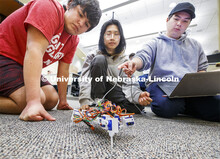 Students in Mark Bauer ECEN 102 - Introduction to Electrical Engineering class work on small robots 