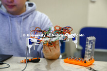Students in Mark Bauer ECEN 102 - Introduction to Electrical Engineering class work on small robots 