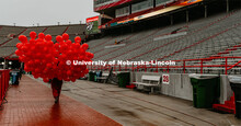 Getting first touchdown ballons ready for game. Nebraska vs. Iowa State University football game. No