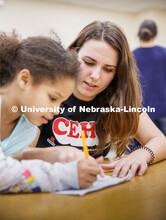 Samantha Wolff, a senior secondary education major, works with Hartley Elementary students during th