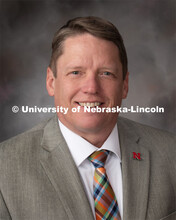 Studio portrait of David Doty, Director of Sponsored Programs for the Office of Research and Economi