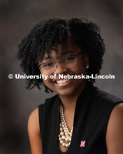 Studio portrait of Mya Lesley Drakeford, Graduate Research Assistant, OASIS. December 17, 2019. 