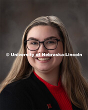 Studio portrait of Bridgett Grant, Graduate Research Assistant, OASIS. December 17, 2019. 