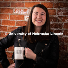 Studio portrait of Taylor DeMaro, Senior Manager of Integrated Content, Office of University Communi