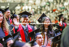 David Nguyen waves to his family. December Undergraduate commencement at Pinnacle Bank Arena. Decemb