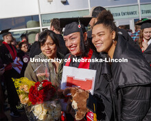 Athena Muhs and her family pose for photos after commencement. December Undergraduate commencement a